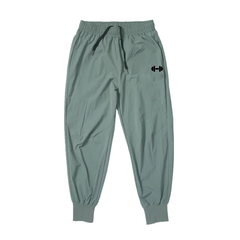 Pantalones deportivos de culturismo para hombre, pantalón de entrenamiento informal, cintura elástica, ultrafino, secado rápido, cintura alta, largo, suelto