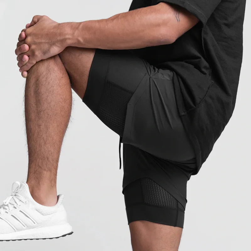 2025 nuevos pantalones cortos deportivos transpirables de doble capa gimnasios Fitness culturismo entrenamiento playa de secado rápido 2 en 1 pantalones cortos para correr para hombre