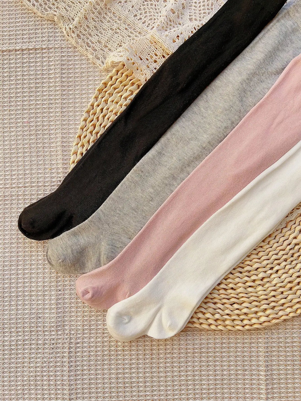 4 pares de medias sólidas con lazo para niñas pequeñas