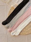 4 pares de medias sólidas con lazo para niñas pequeñas