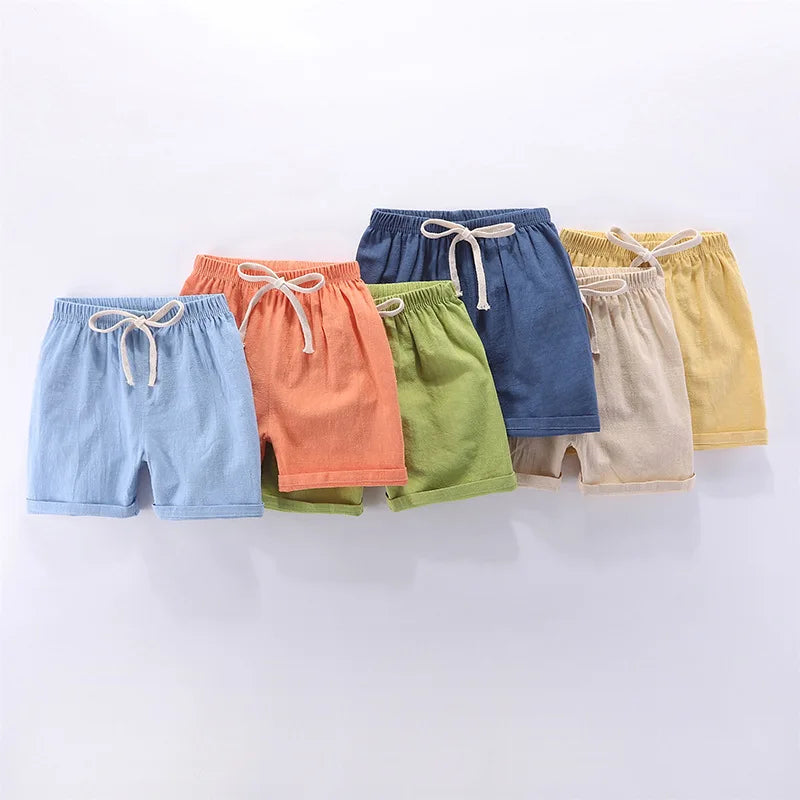 Pantalones cortos para niños y niñas, pantalones cortos deportivos de lino y algodón para verano, finos, transpirables, con cintura elástica, para playa, pantalones cortos informales sueltos para chico