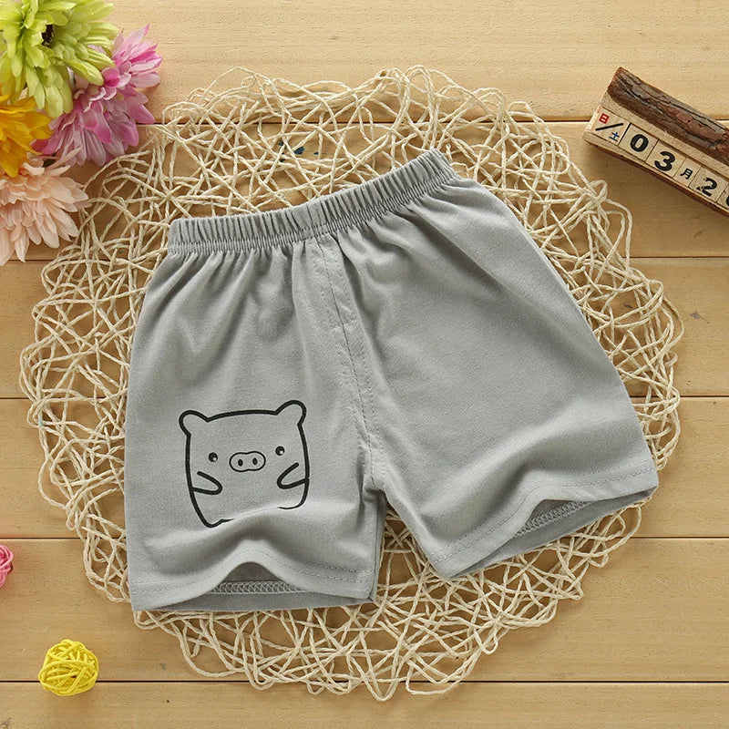 Pantalones cortos para niños y niñas, ropa para niños, pantalones cortos de algodón sólido transpirable de verano para bebés, pantalones cortos deportivos informales para playa elásticos