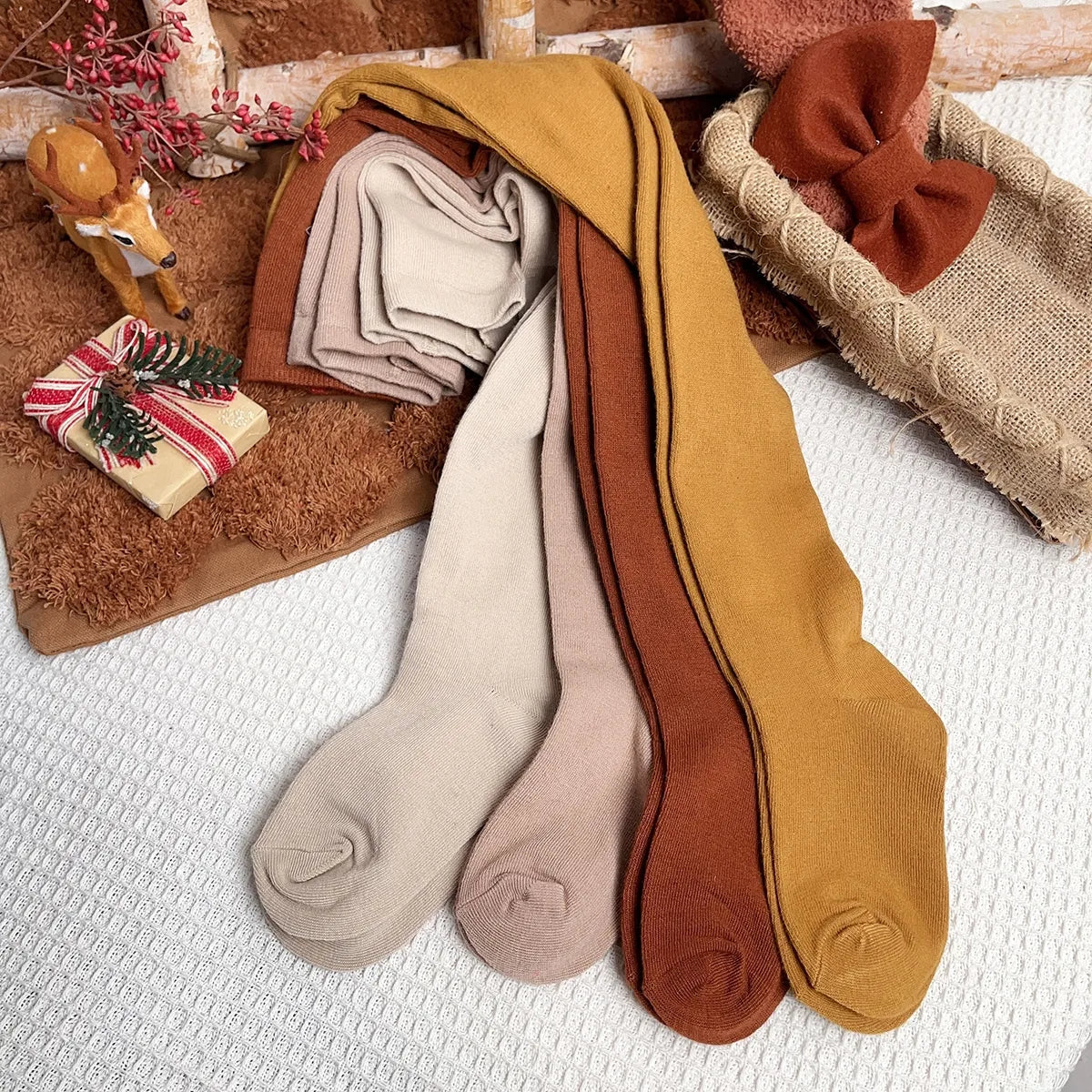 4 pares de medias sólidas con lazo para niñas pequeñas