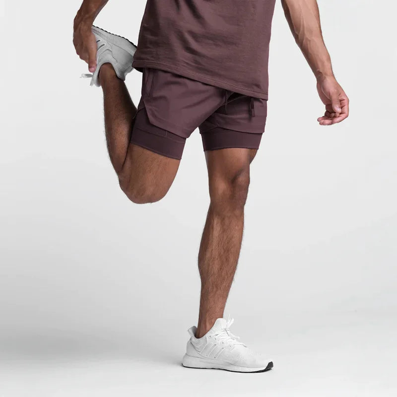 2025 nuevos pantalones cortos deportivos transpirables de doble capa gimnasios Fitness culturismo entrenamiento playa de secado rápido 2 en 1 pantalones cortos para correr para hombre