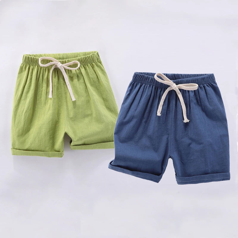 Pantalones cortos para niños y niñas, pantalones cortos deportivos de lino y algodón para verano, finos, transpirables, con cintura elástica, para playa, pantalones cortos informales sueltos para chico