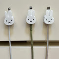Lindo Miffy Rabbit organizador de cables de datos magnéticos dibujos animados fijador de carga de teléfono de escritorio Clip montado en la pared