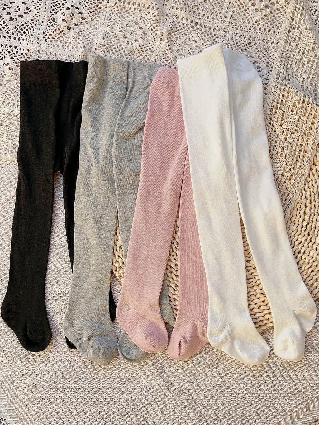 4 pares de medias sólidas con lazo para niñas pequeñas