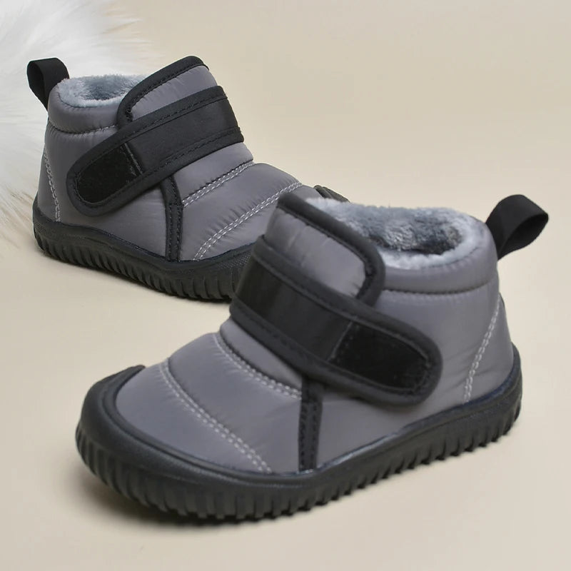 Botas cortas de nieve de invierno de felpa suave impermeables antideslizantes al aire libre duraderas de alta calidad para niños E8218