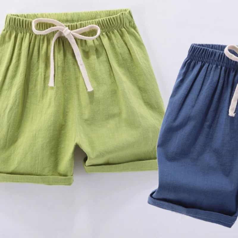 Pantalones cortos para niños y niñas, pantalones cortos deportivos de lino y algodón para verano, finos, transpirables, con cintura elástica, para playa, pantalones cortos informales sueltos para chico
